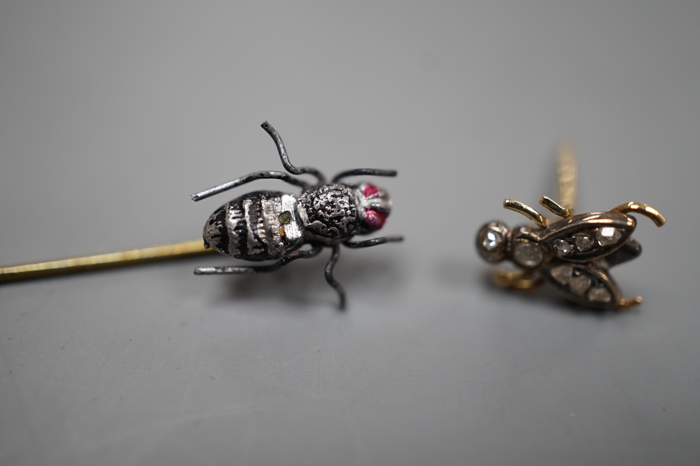 A 19th century yellow metal and rose cut diamond set 'fly' stud, 8mm and a bug stick pin.